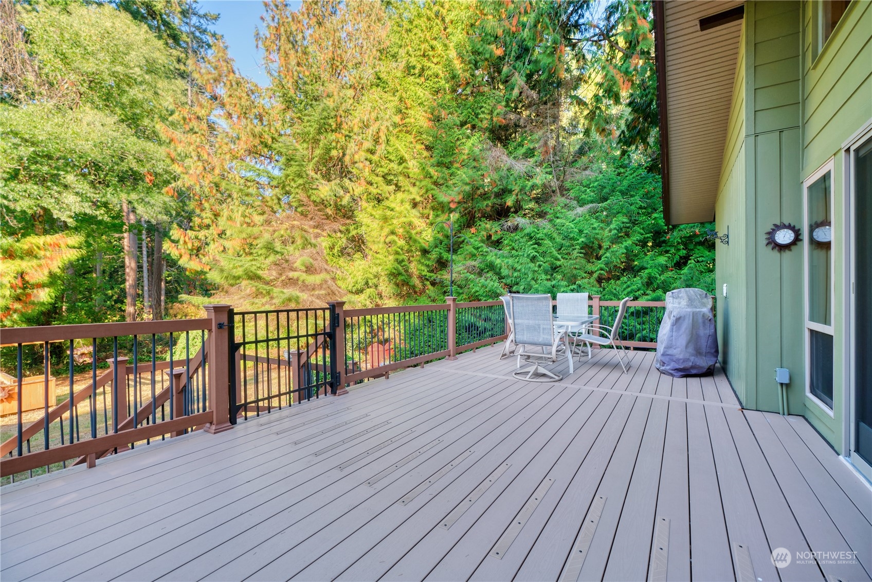 1986 Wellington Road Point Roberts, WA 98281 - Photo 17 of 26 a balcony with wooden floor and fence