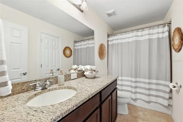 a view of a hallway view with staircase