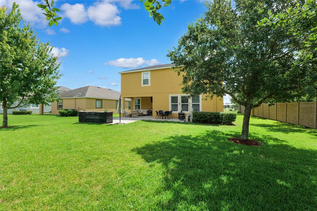 1653 Nature View Drive Lutz, FL 33558 - Photo 39 of 63 a house view with a garden space