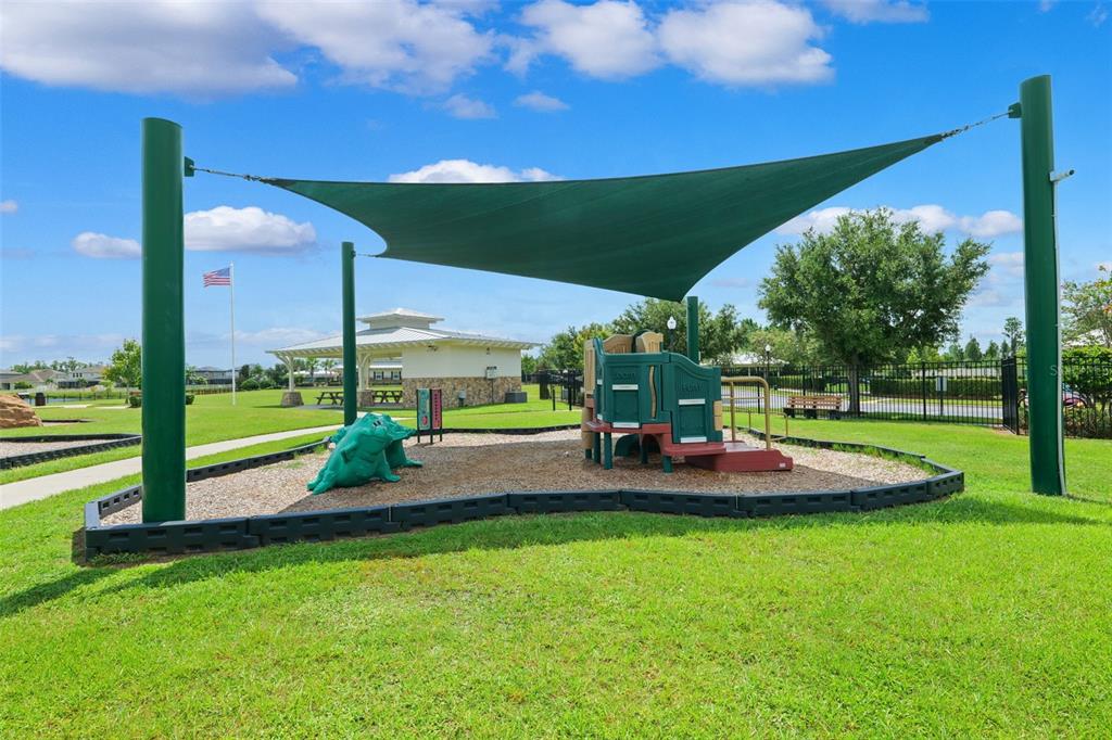 1653 Nature View Drive Lutz, FL 33558 - Photo 43 of 63 a view of outdoor space with playground and green space