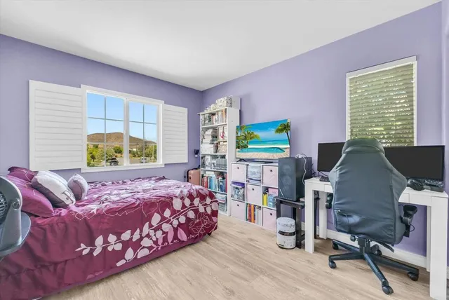 a view of a patio with couches chairs and potted plants