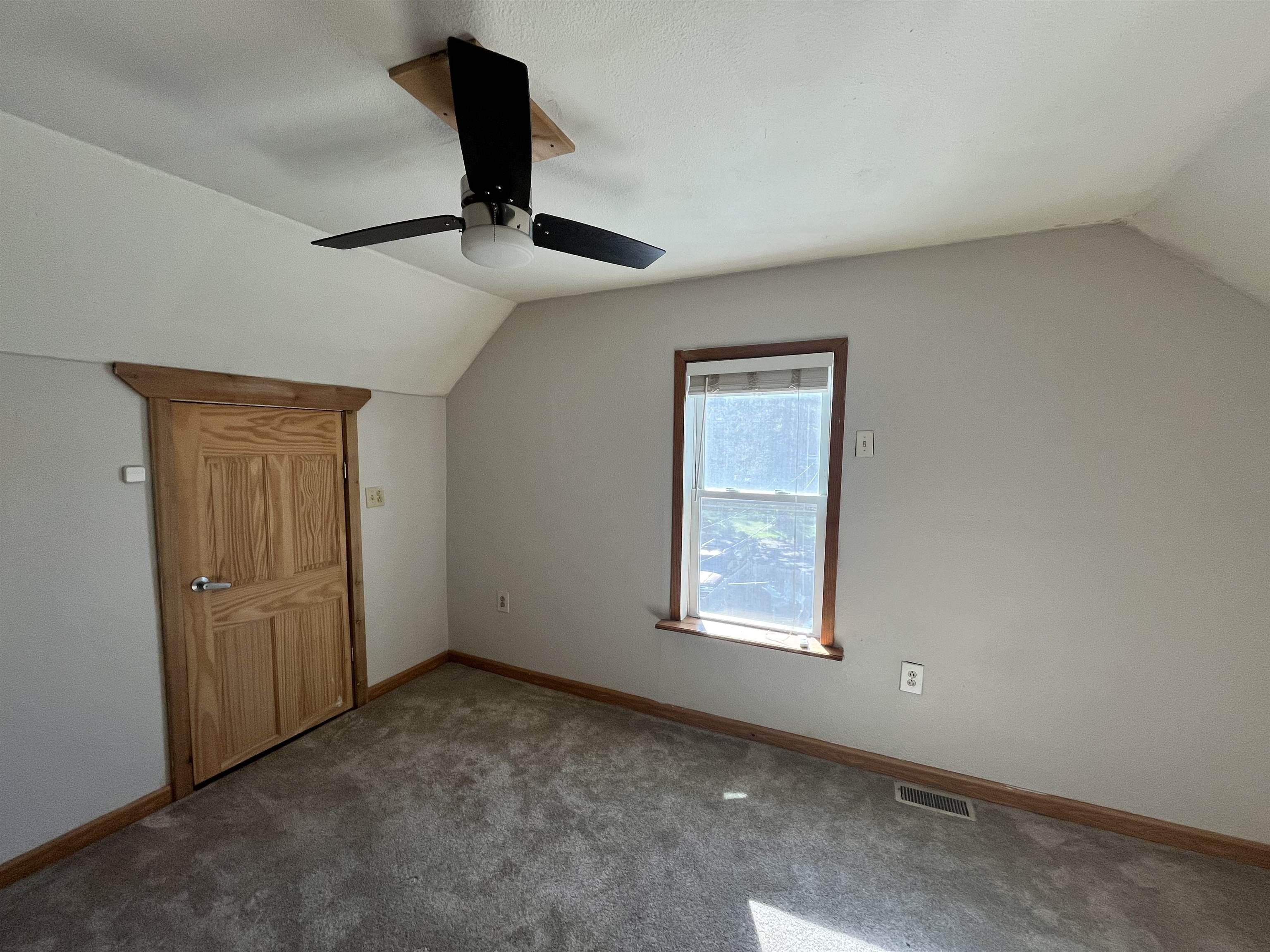14 3rd Street Proctor, MN 55810 - Photo 15 of 19 Additional living space with vaulted ceiling and carpet