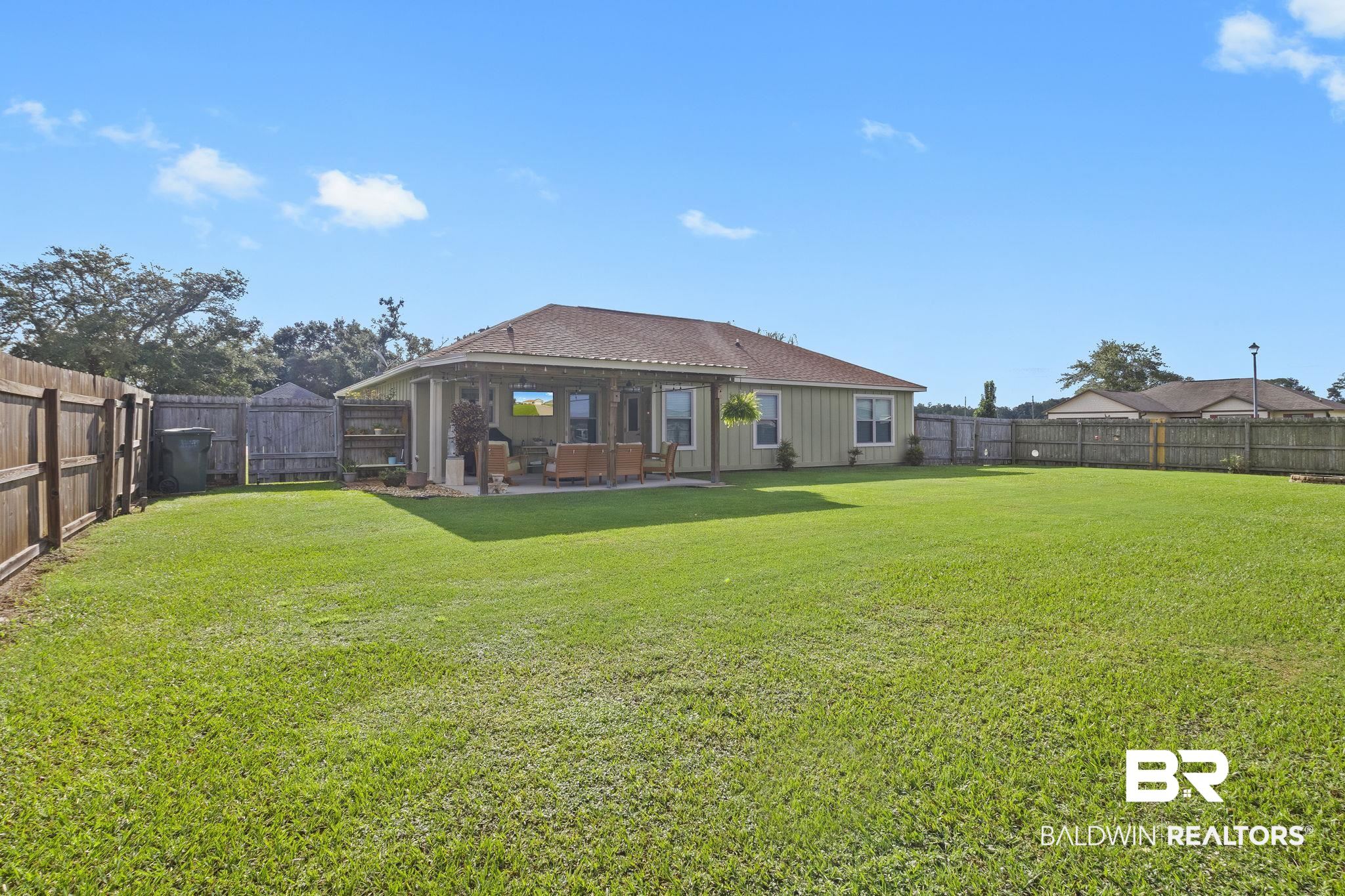 203 Lakefront Circle Summerdale, AL 36580 - Photo 60 of 69 View of yard featuring a patio