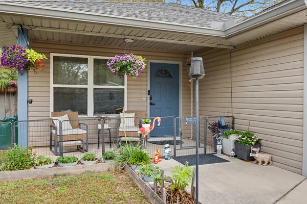 a picture of a book and a white bed
