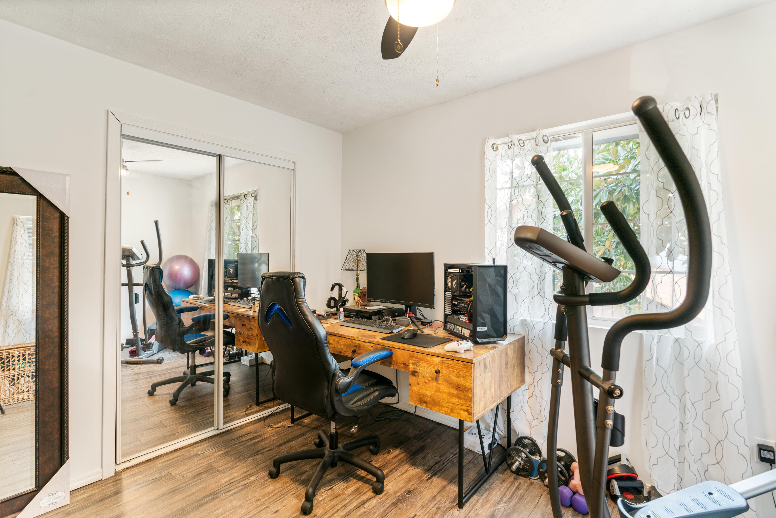 400 West Harborview Road Santa Rosa Beach, FL 32459 - Photo 26 of 39 a view of a workspace with furniture and a window