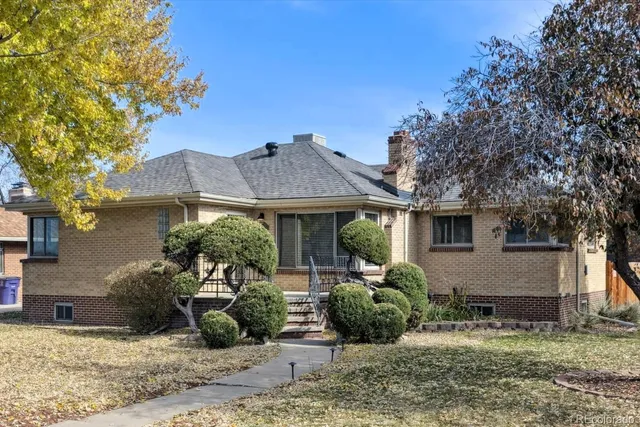 a view of a house with a garden