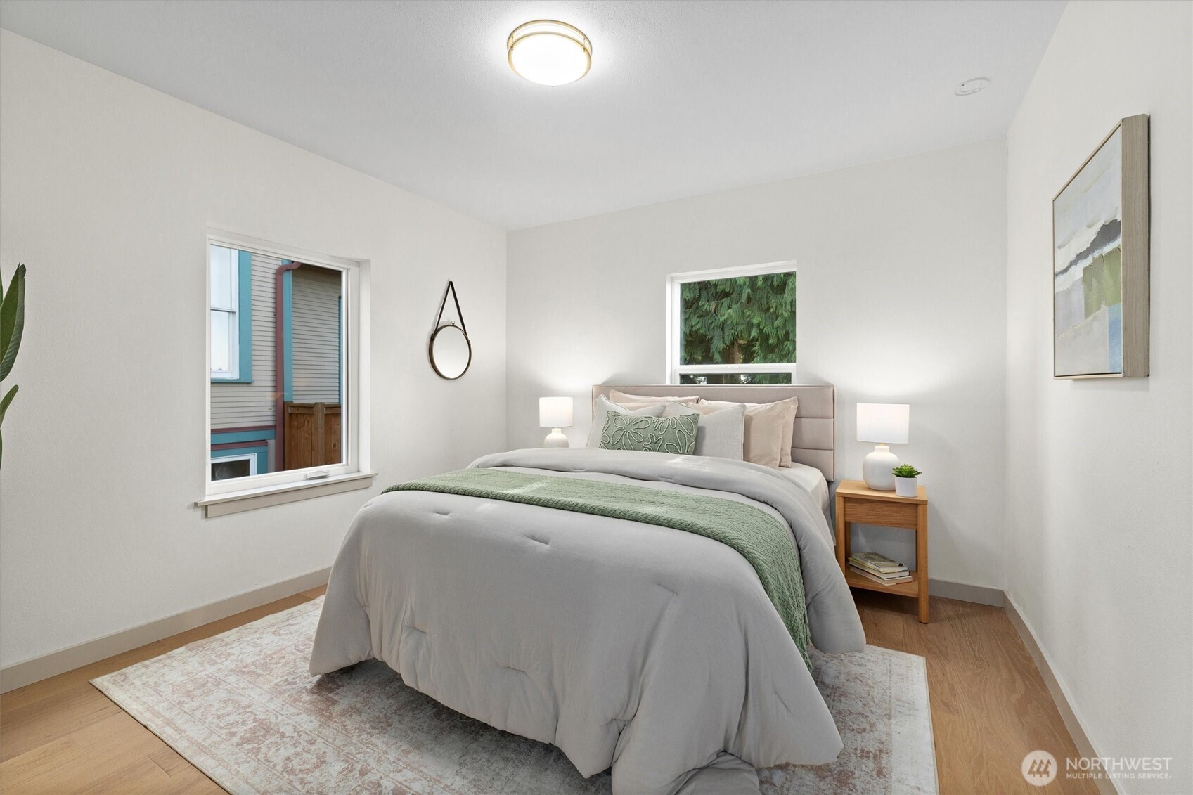 3711 Southwest Webster Street Seattle, WA 98126 - Photo 15 of 39 a bedroom with a bed and window