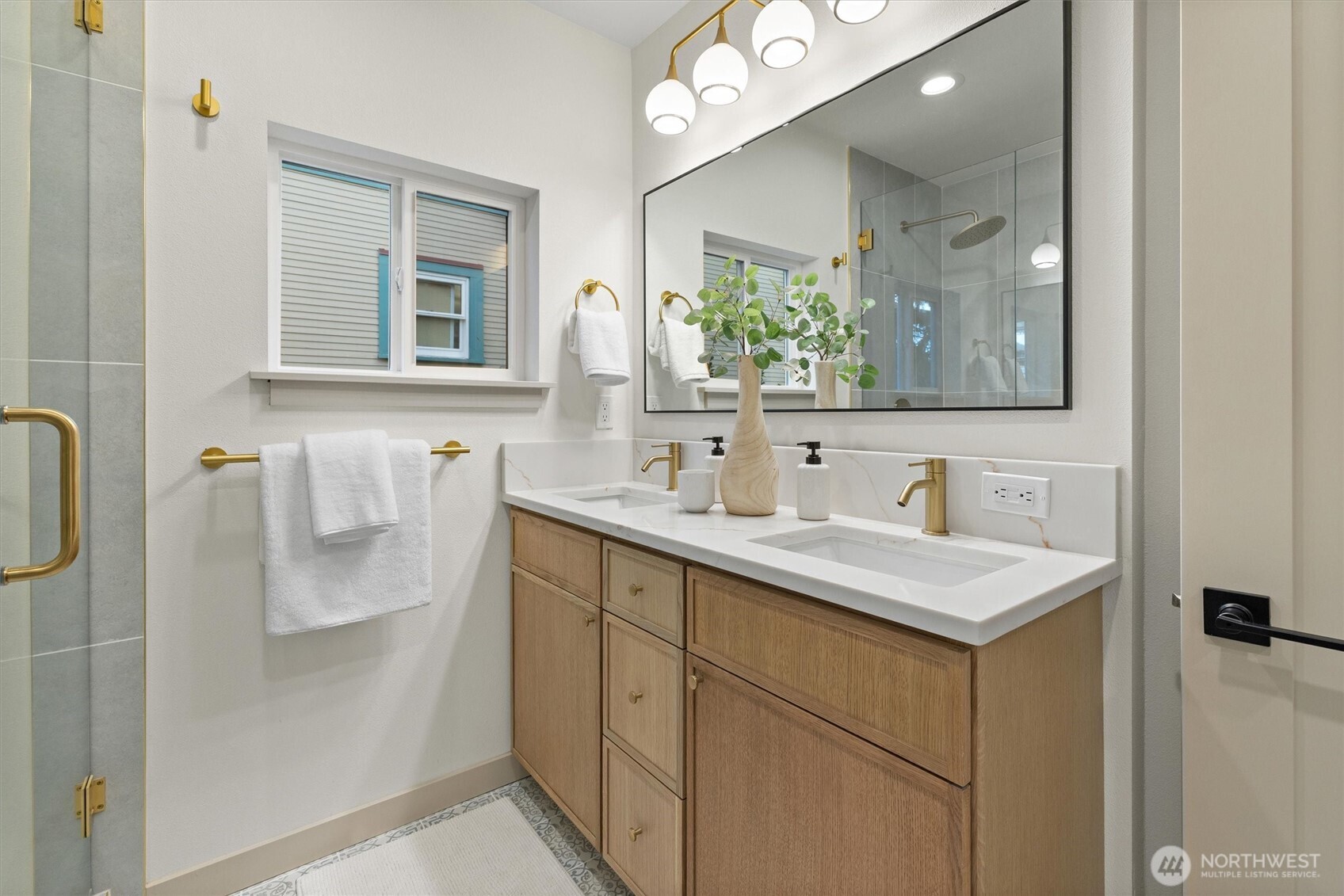 3711 Southwest Webster Street Seattle, WA 98126 - Photo 17 of 39 a bathroom with a granite countertop sink vanity and mirror