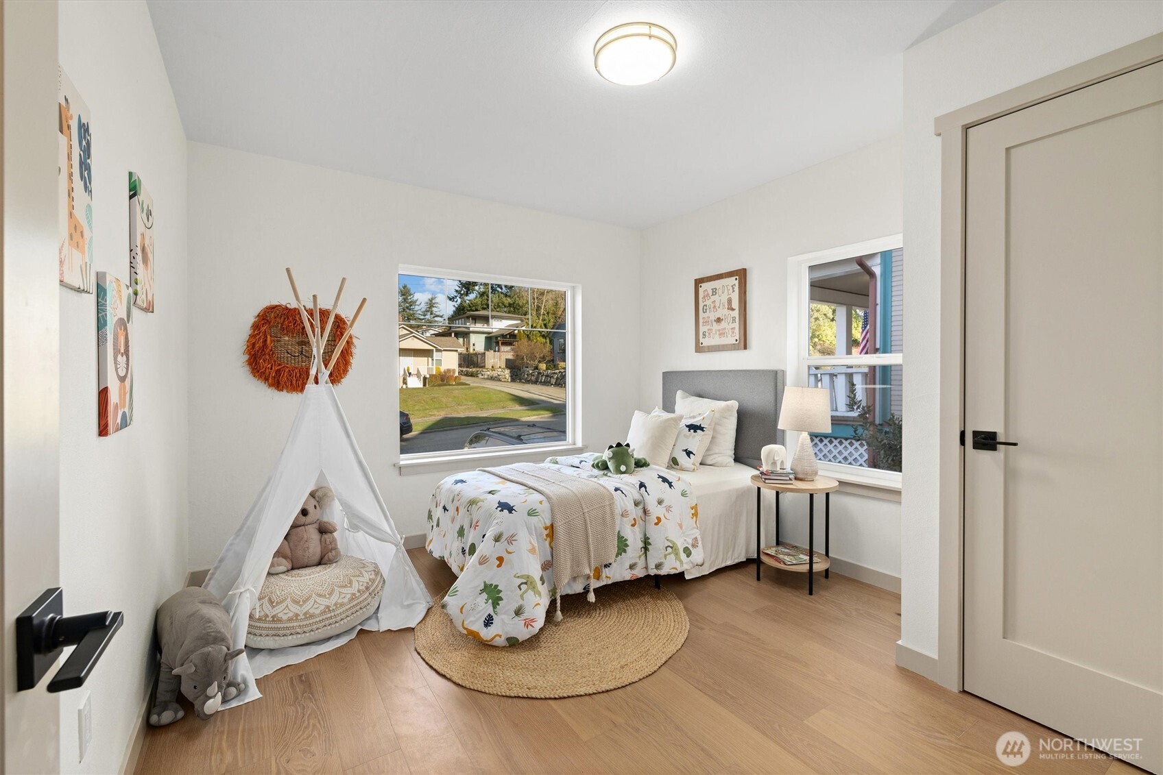 3711 Southwest Webster Street Seattle, WA 98126 - Photo 18 of 39 a bedroom with furniture and a bed