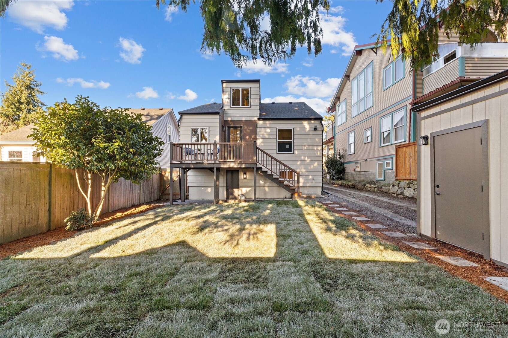 3711 Southwest Webster Street Seattle, WA 98126 - Photo 2 of 39 a view of a house with a yard