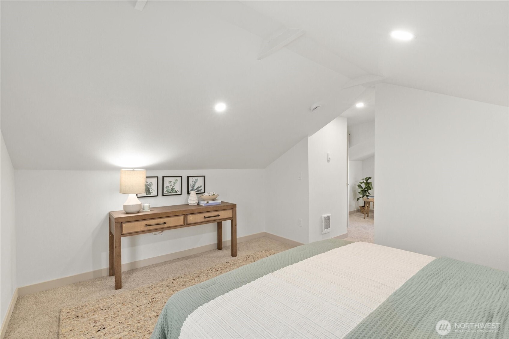 3711 Southwest Webster Street Seattle, WA 98126 - Photo 21 of 39 a bedroom with a bed and a table