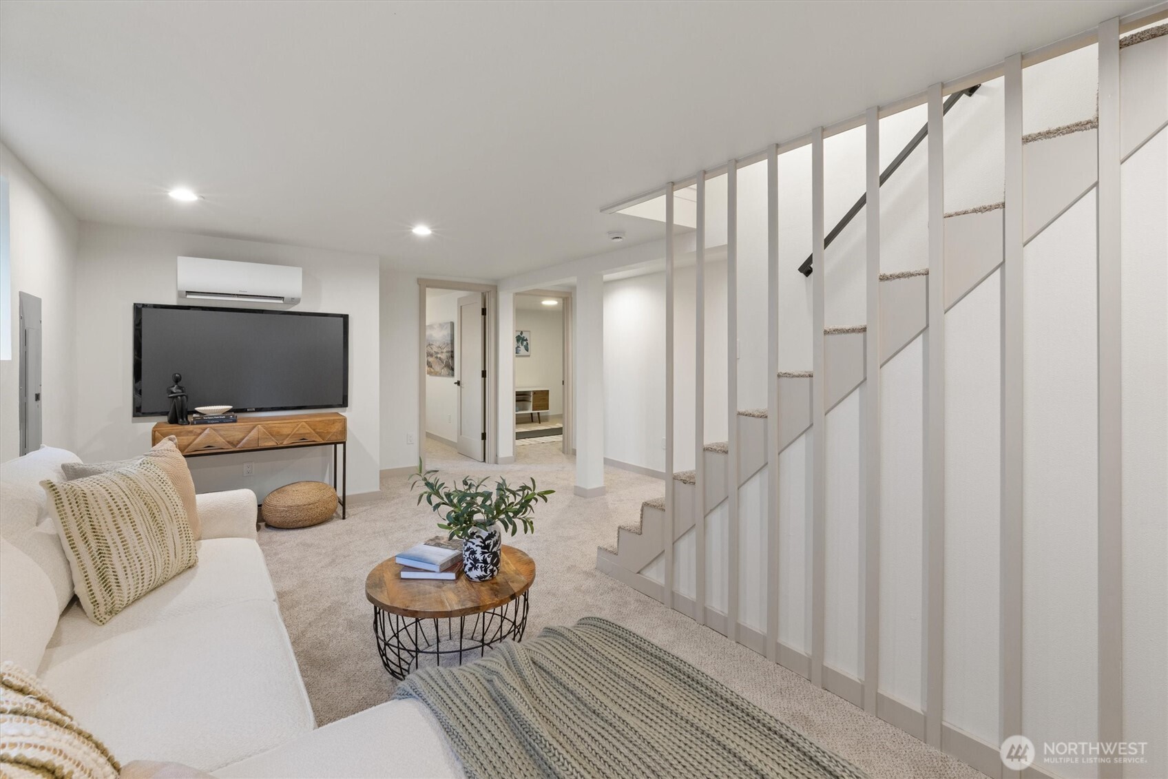 3711 Southwest Webster Street Seattle, WA 98126 - Photo 28 of 39 a living room with furniture and a flat screen tv