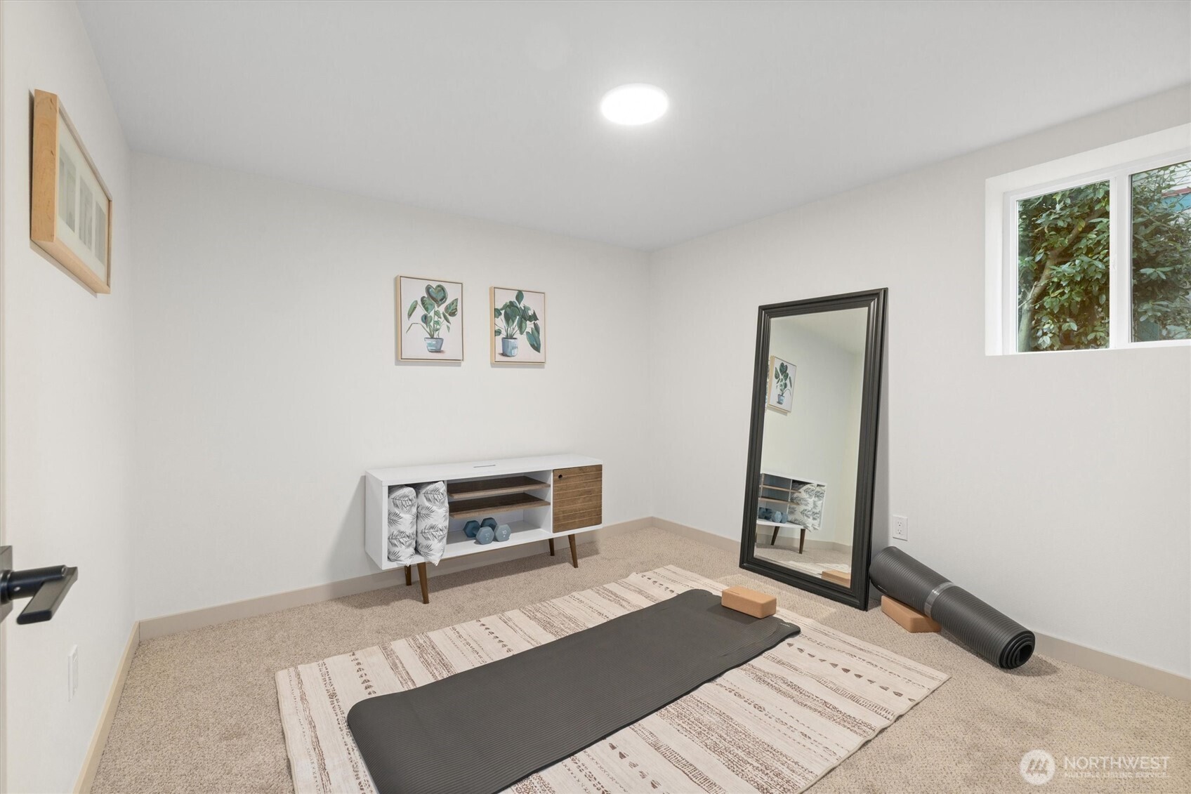 3711 Southwest Webster Street Seattle, WA 98126 - Photo 31 of 39 a room with a bed and a mirror