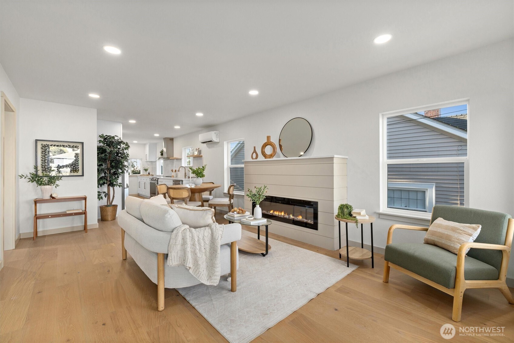 3711 Southwest Webster Street Seattle, WA 98126 - Photo 4 of 39 a living room with furniture and a fireplace