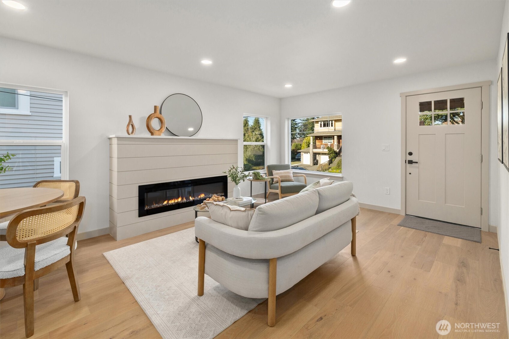 3711 Southwest Webster Street Seattle, WA 98126 - Photo 5 of 39 a living room with furniture a rug and a fireplace