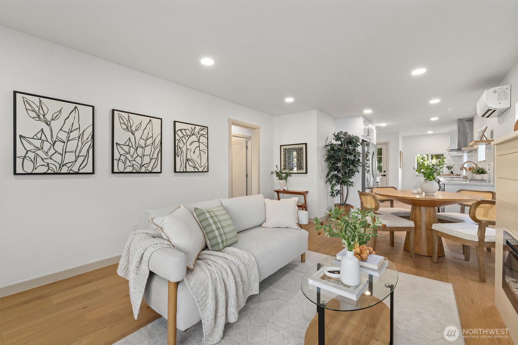 3711 Southwest Webster Street Seattle, WA 98126 - Photo 8 of 39 a living room with furniture and a dining table with kitchen view