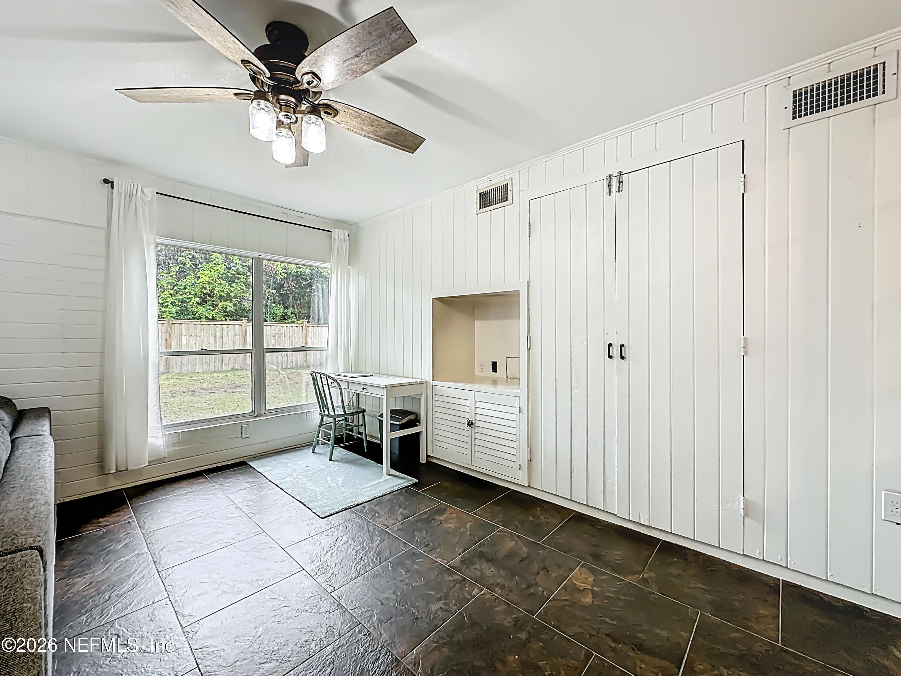 5553 Salerno Road Jacksonville, FL 32244 - Photo 26 of 42 Family Room Storage Closet