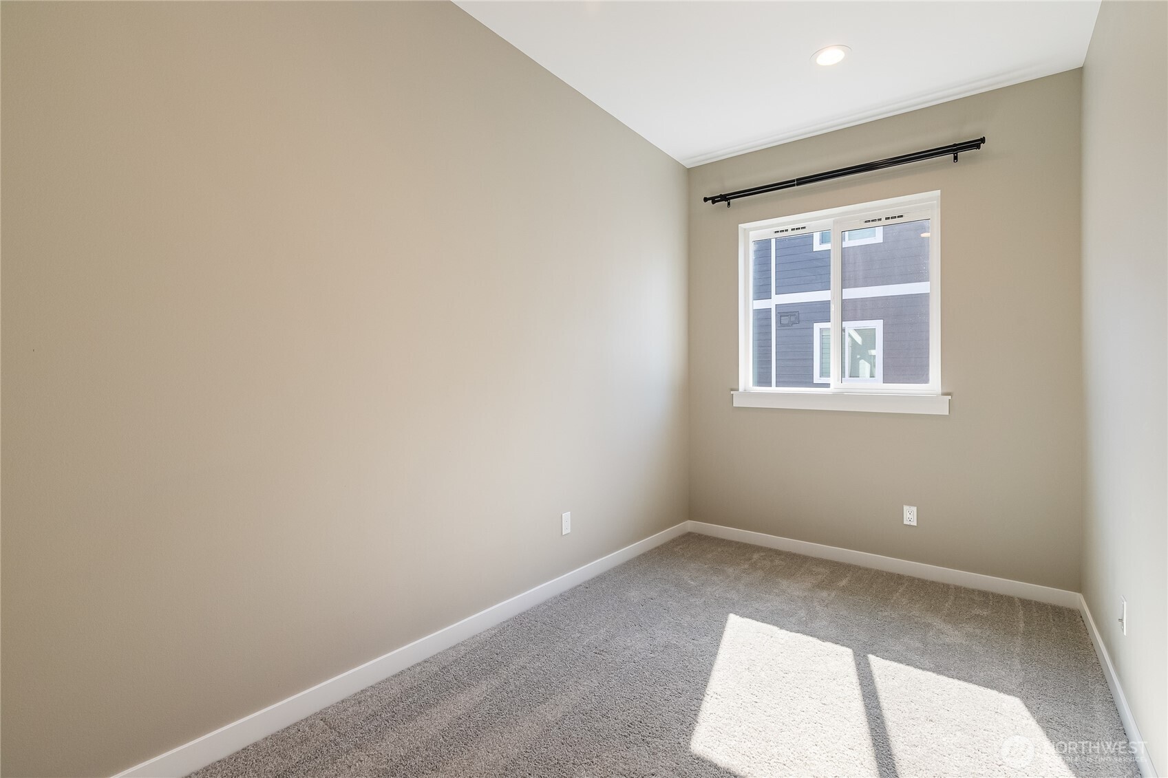 5686 Sunstone Place, Unit 101 Ferndale, WA 98248 - Photo 23 of 32 an empty room with a window