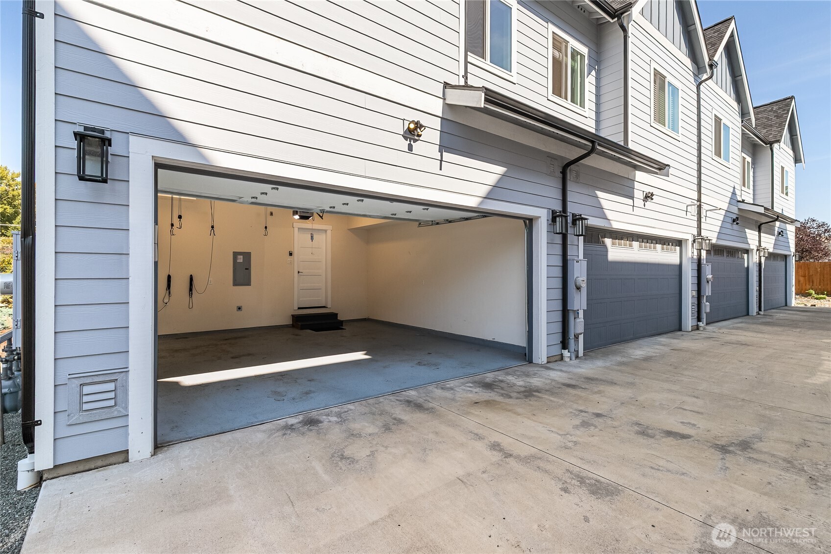 5686 Sunstone Place, Unit 101 Ferndale, WA 98248 - Photo 30 of 32 a view of a garage