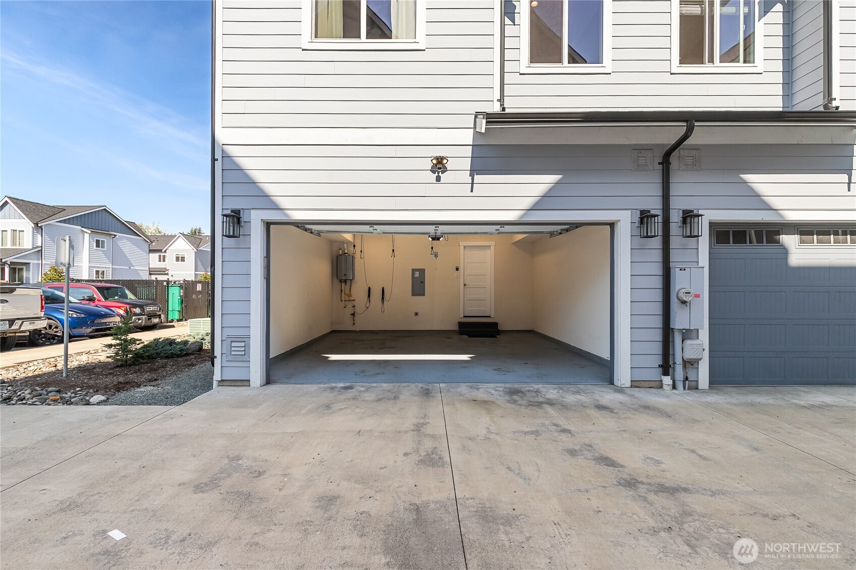 5686 Sunstone Place, Unit 101 Ferndale, WA 98248 - Photo 31 of 32 a view of a house with a yard