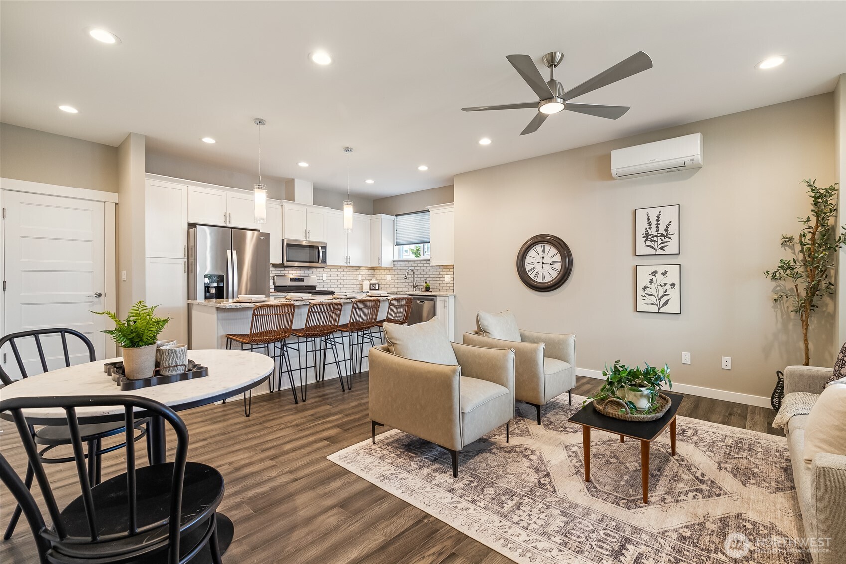 5686 Sunstone Place, Unit 101 Ferndale, WA 98248 - Photo 4 of 32 a living room with furniture and a view of kitchen