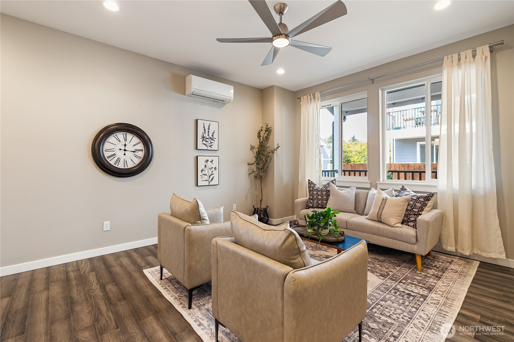 5686 Sunstone Place, Unit 101 Ferndale, WA 98248 - Photo 5 of 32 a living room with furniture and a large window