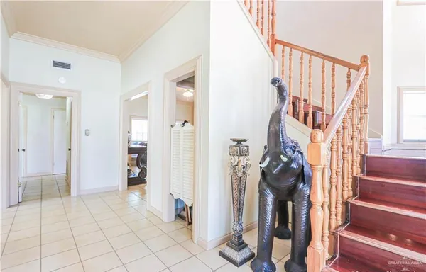 a view of an entryway with staircase