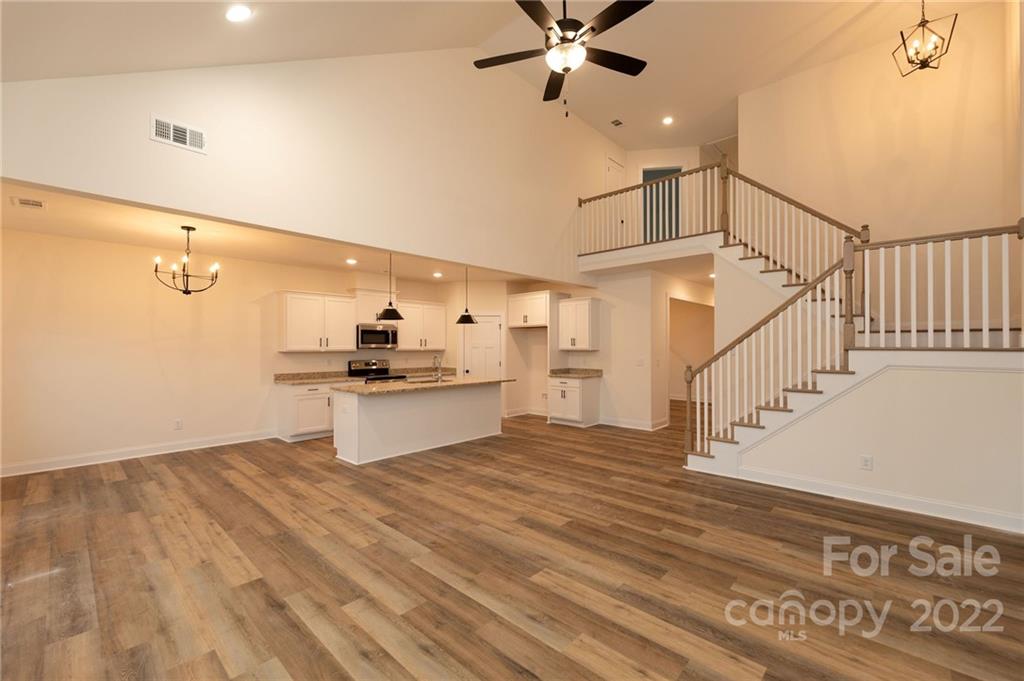 2217 State Rd S-46-1474, Unit 15 Clover, SC 29710 - Photo 3 of 39 a living room with wooden floor and white walls