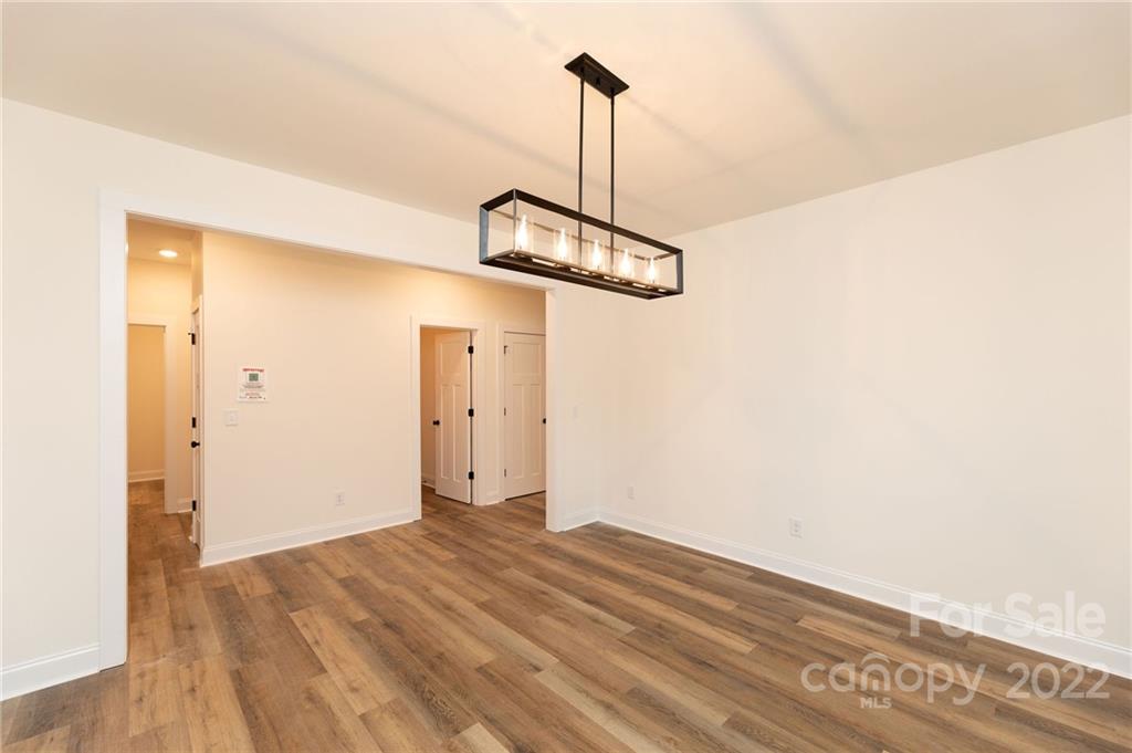 2217 State Rd S-46-1474, Unit 15 Clover, SC 29710 - Photo 4 of 39 a view of a room with wooden floor