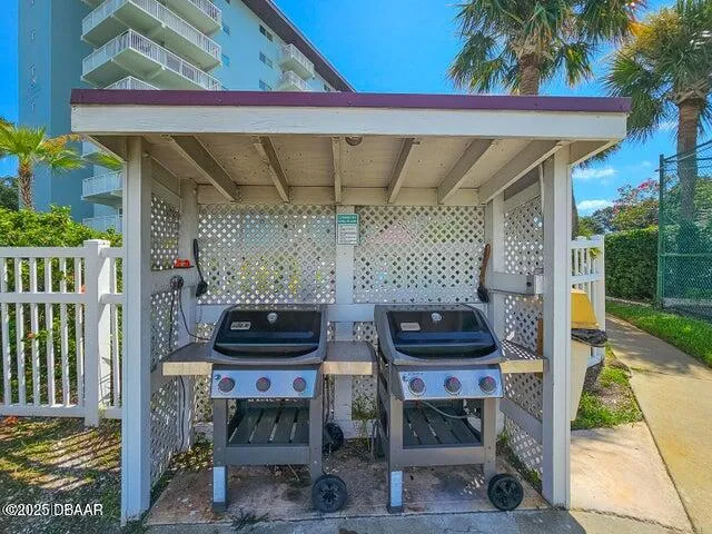 a view of a balcony with furniture