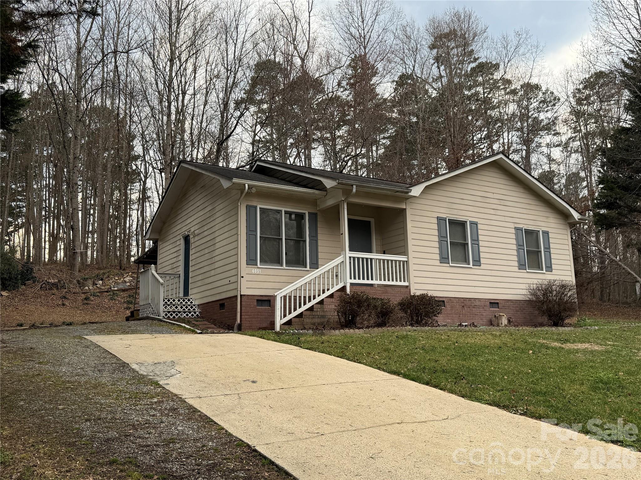 4051 Plum Street Conover, NC 28613 - Photo 1 of 10 a front view of house with yard and green space