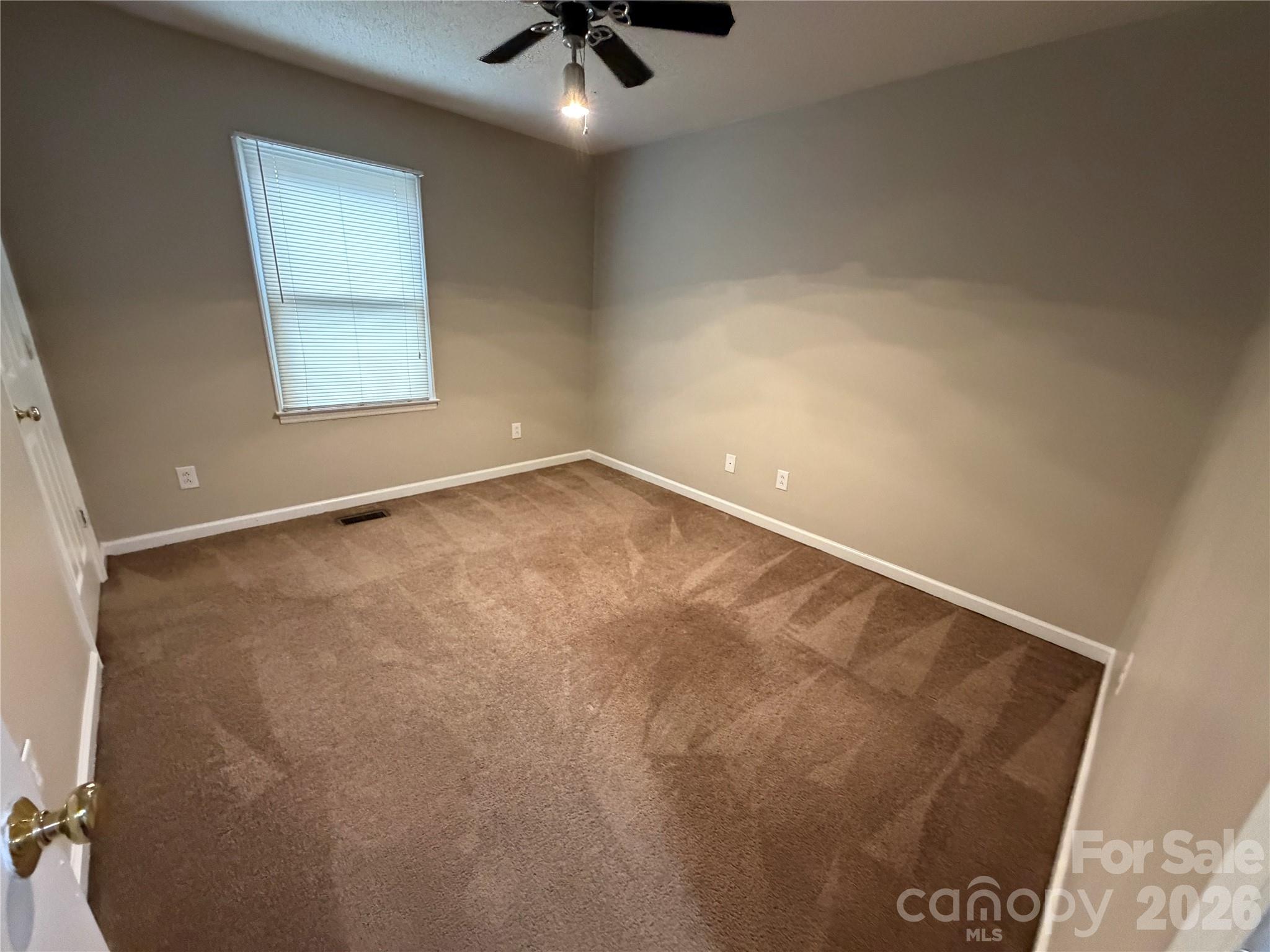 4051 Plum Street Conover, NC 28613 - Photo 8 of 10 an empty room with a window
