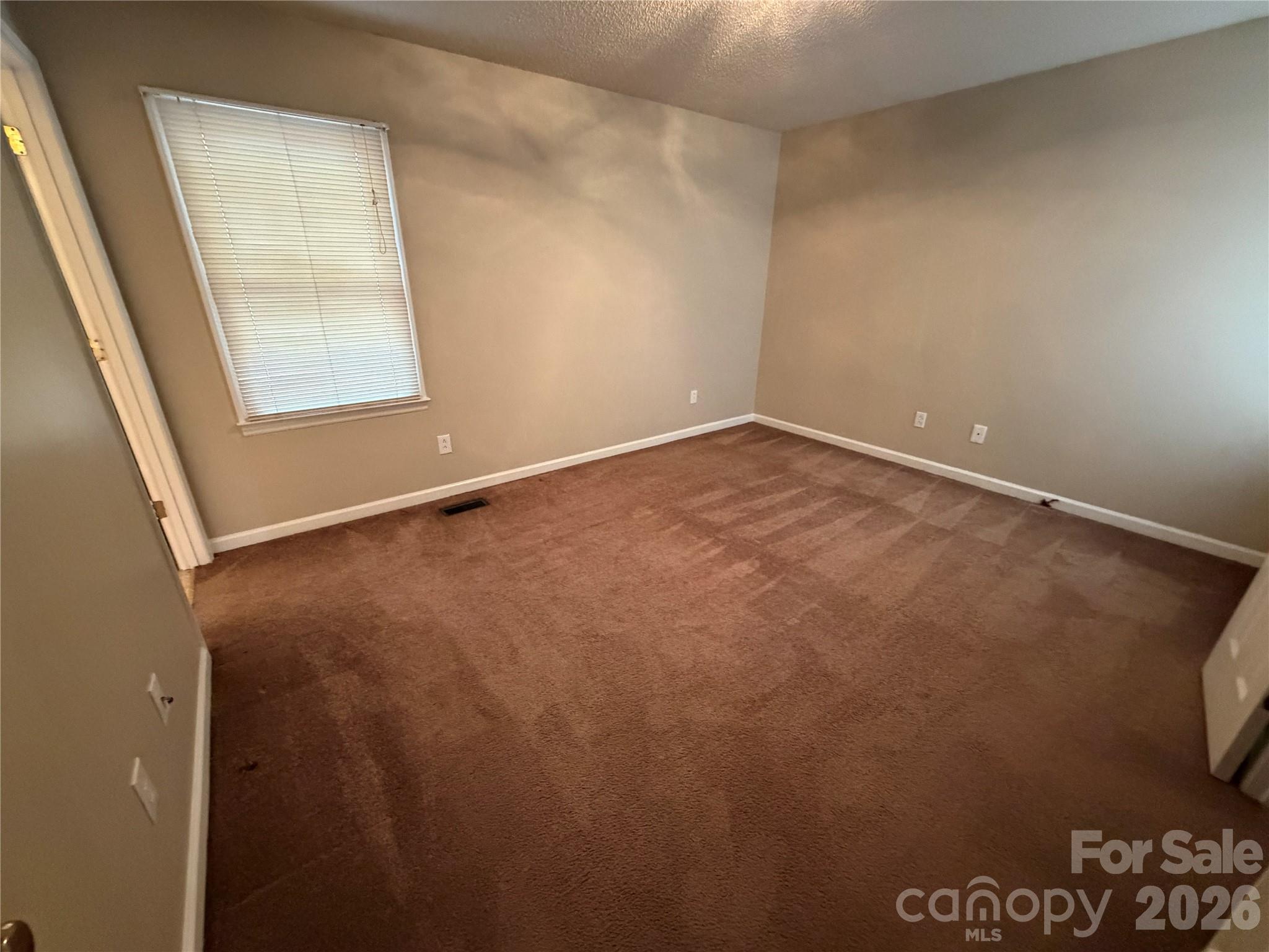 4051 Plum Street Conover, NC 28613 - Photo 9 of 10 an empty room with a window