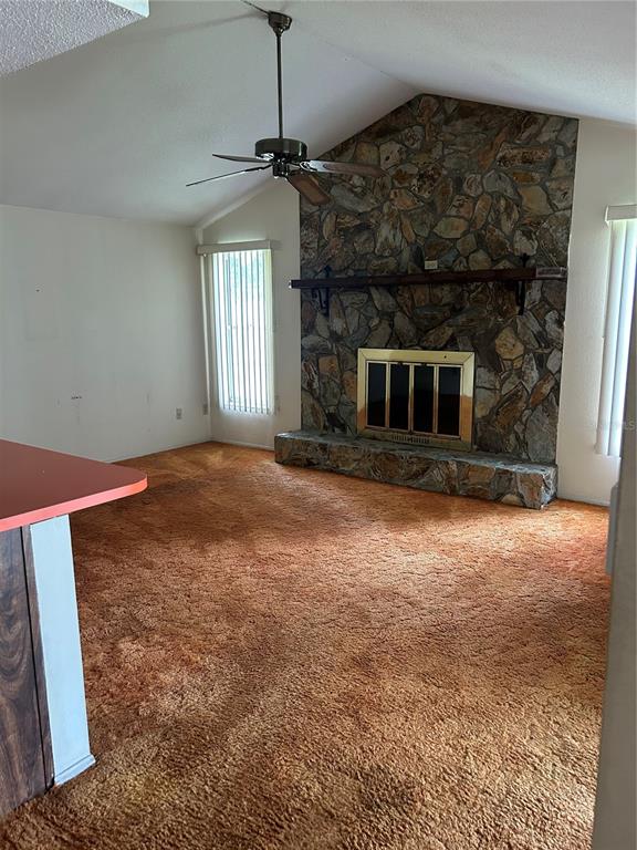 8511 Longboat Lane Hudson, FL 34667 - Photo 10 of 17 a view of a livingroom with a fireplace