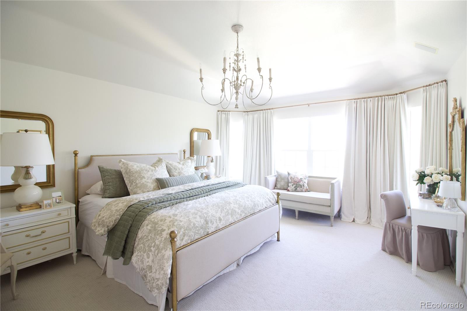 369 Shoreham Circle Castle Pines, CO 80108 - Photo 20 of 41 a bed room with bed and window