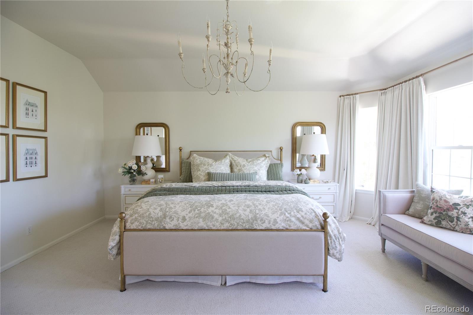 369 Shoreham Circle Castle Pines, CO 80108 - Photo 21 of 41 a spacious bedroom with a bed and window