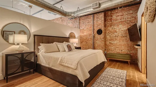 a bathroom with a tub and shower