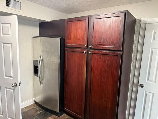 103 Northeast 28th Street Boca Raton, FL 33431 - Photo 13 of 47 a view of a refrigerator in kitchen