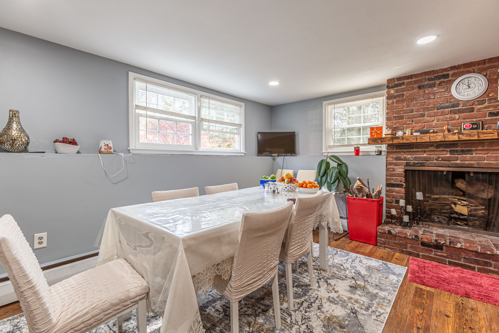 91 Goebel Road Hamden, CT 06514 - Photo 14 of 39 a view of a dining room with furniture window and wooden floor