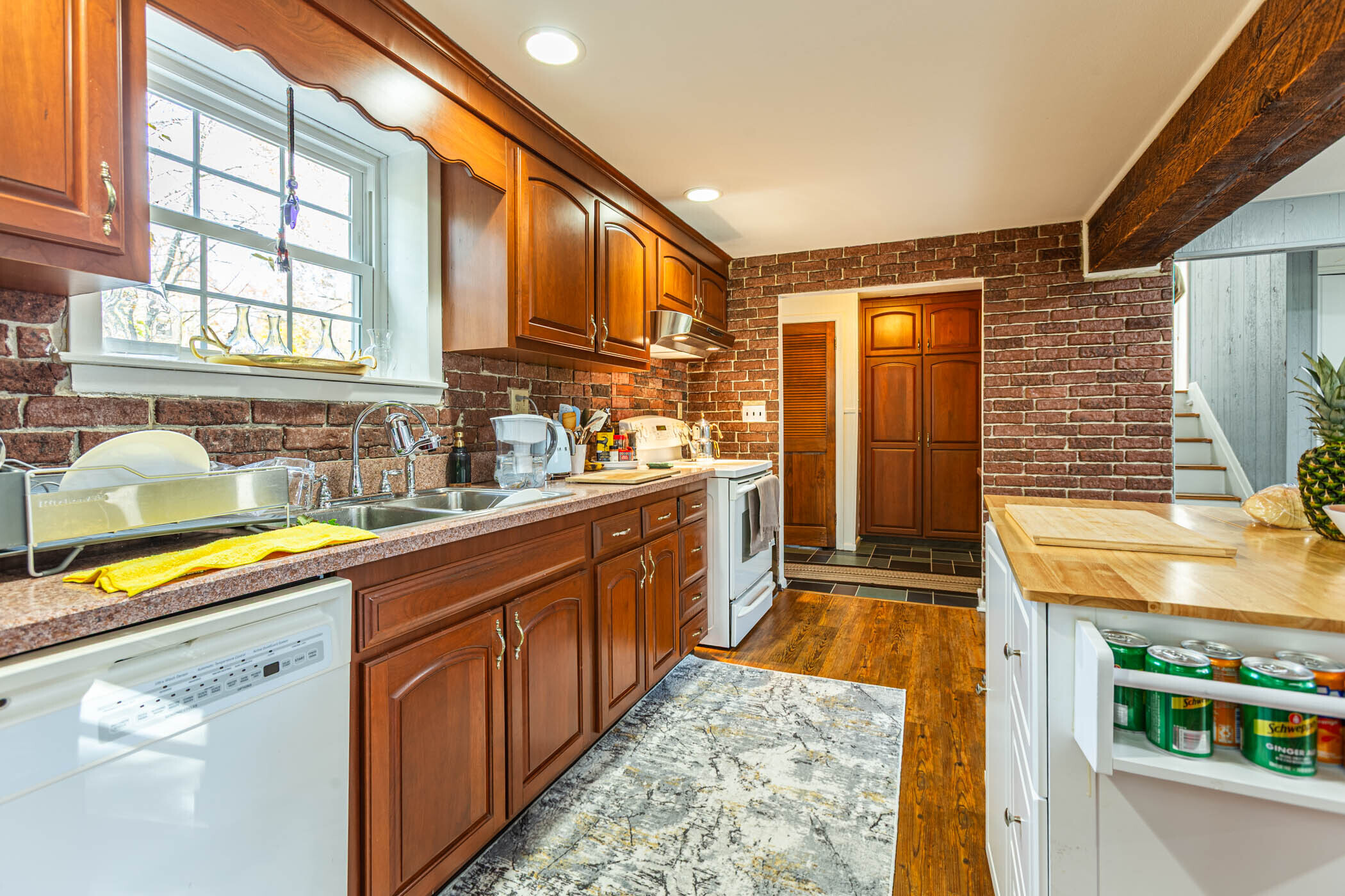 91 Goebel Road Hamden, CT 06514 - Photo 17 of 39 a kitchen with stainless steel appliances granite countertop a sink and a stove