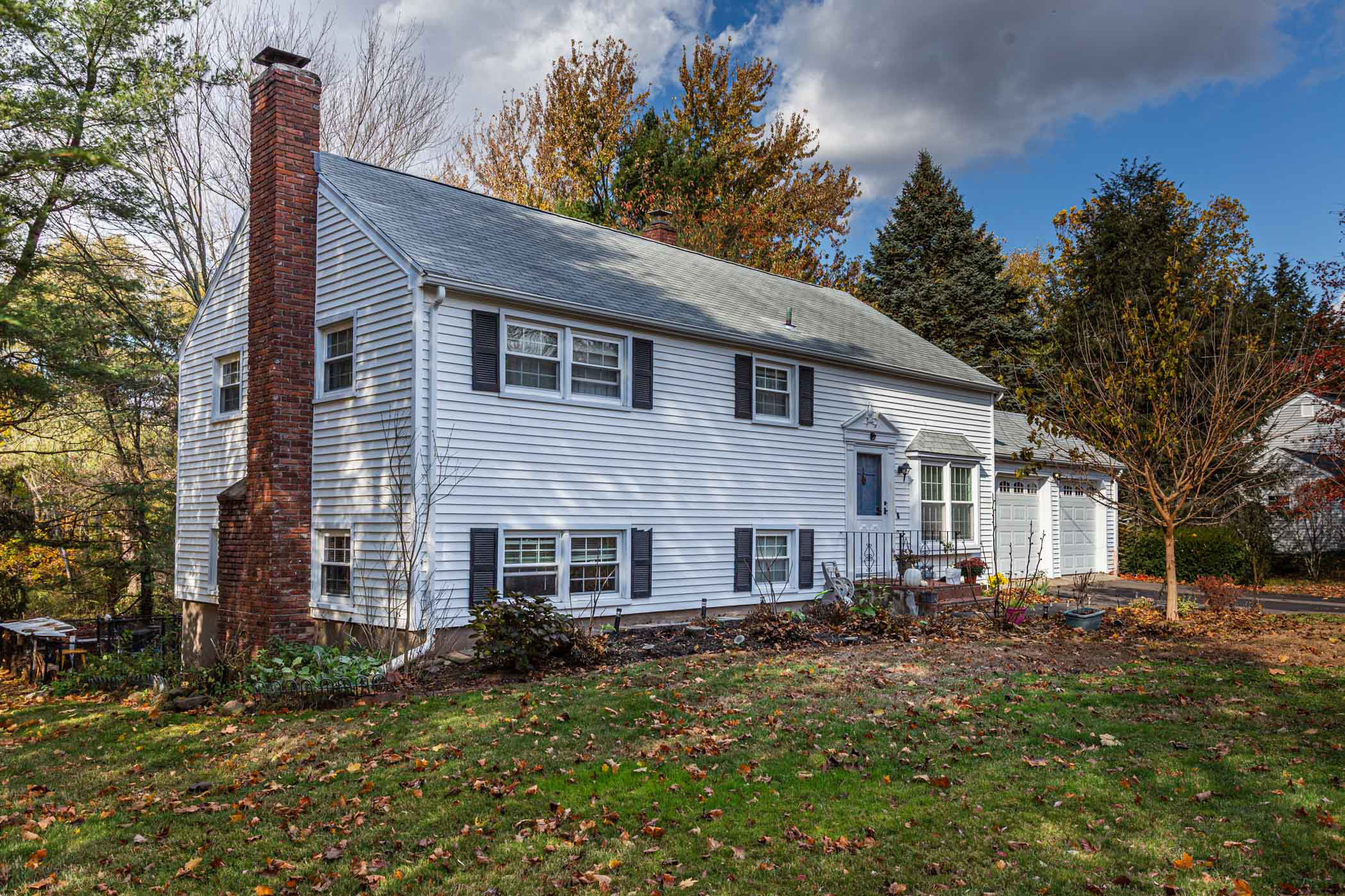 91 Goebel Road Hamden, CT 06514 - Photo 2 of 39 a view of a house with a yard