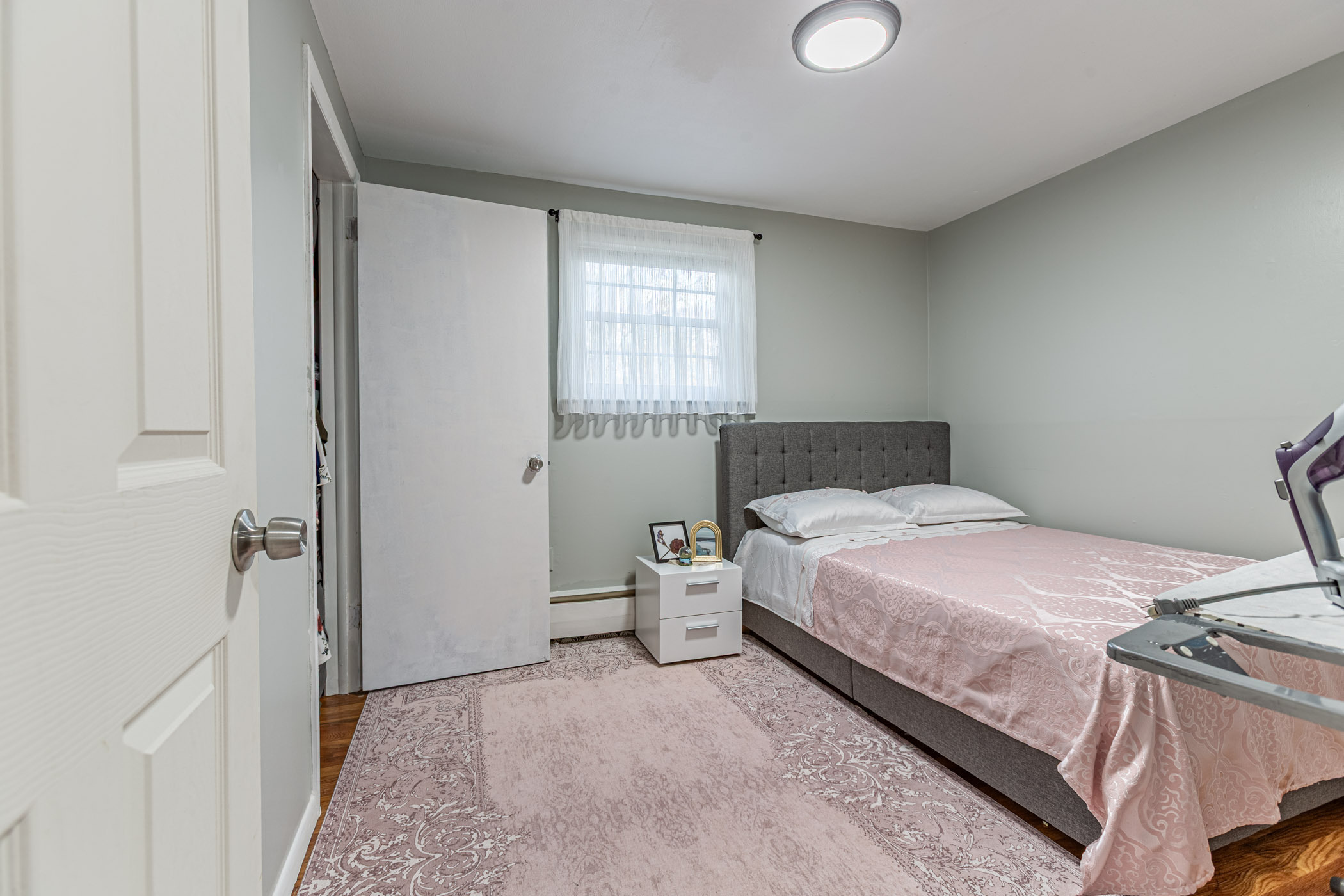 91 Goebel Road Hamden, CT 06514 - Photo 22 of 39 a bedroom with a bed and window