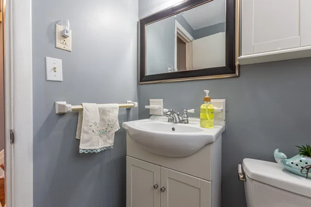 a bathroom with a sink and a toilet