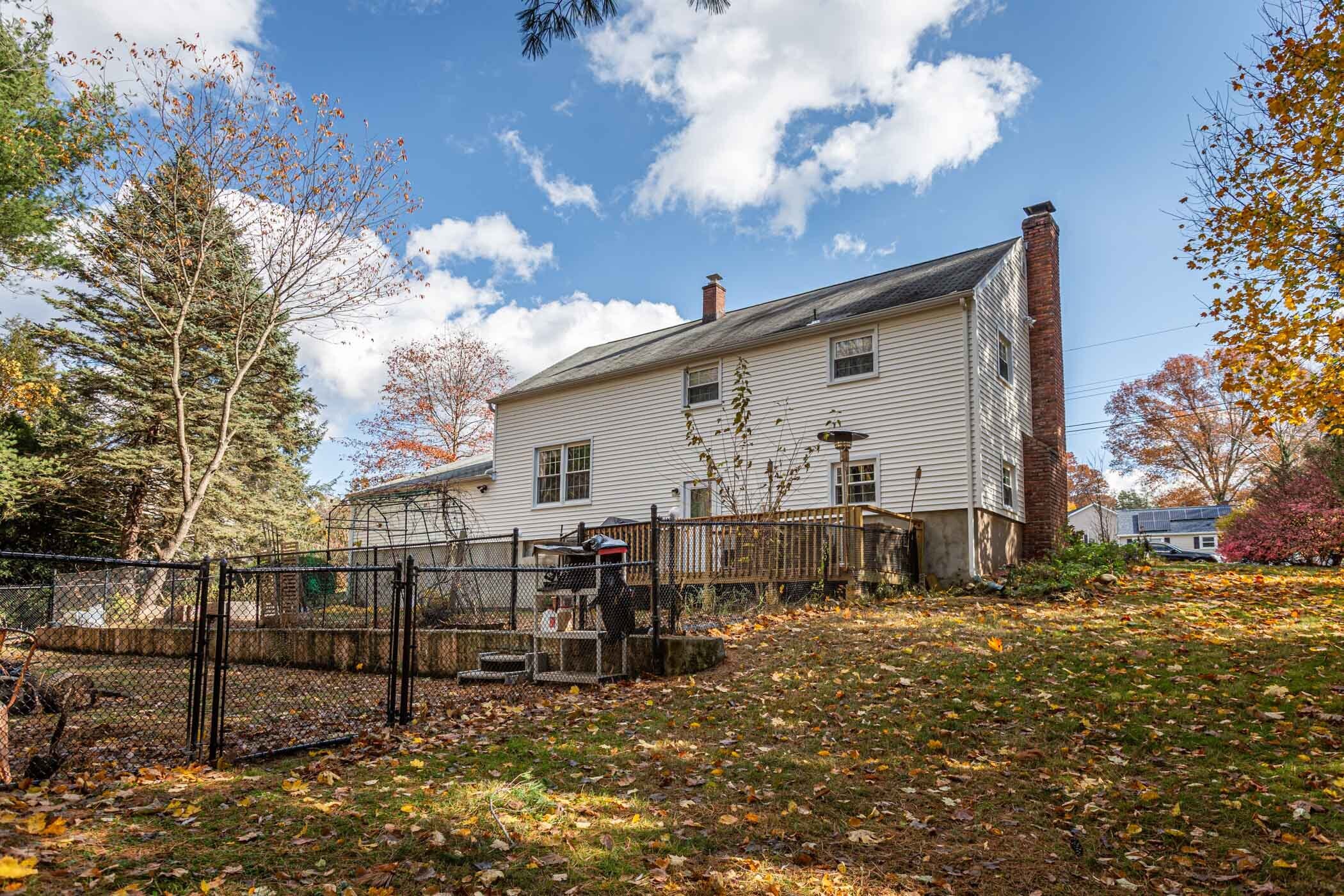 91 Goebel Road Hamden, CT 06514 - Photo 4 of 39 a view of a house with backyard