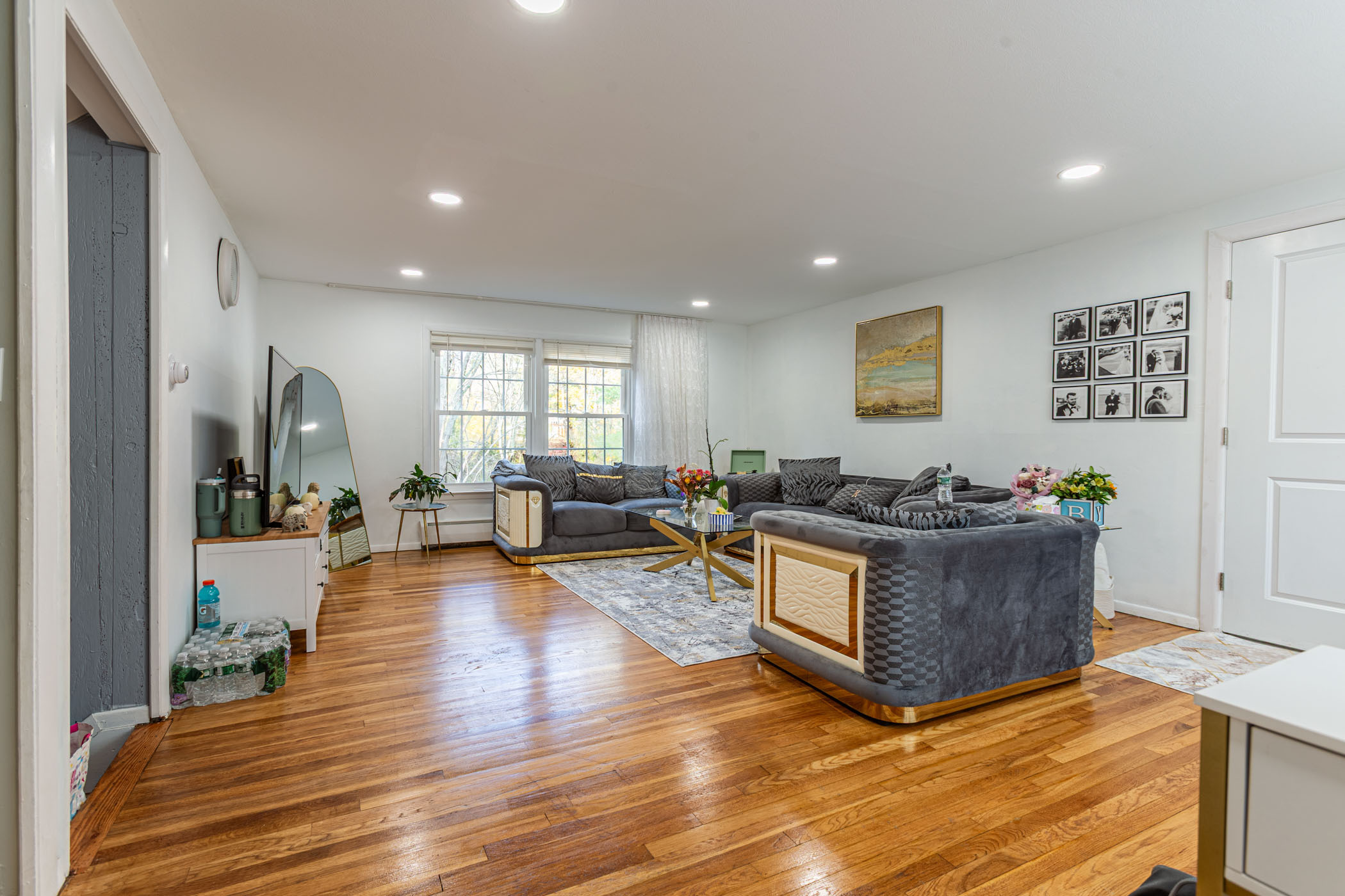 91 Goebel Road Hamden, CT 06514 - Photo 10 of 39 a living room with furniture and a wooden floor