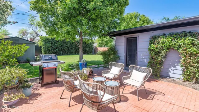 a table and chairs in the patio