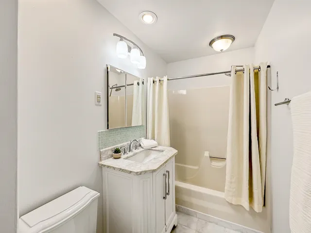 a view of a city with ocean