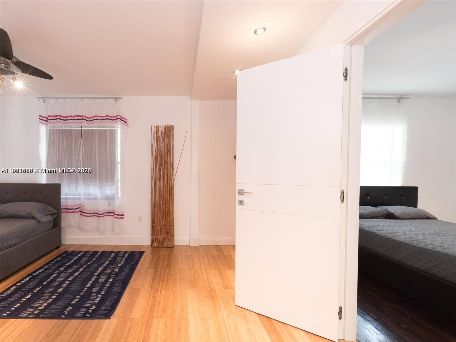 1509 Fletcher Street Hollywood, FL 33020 - Photo 4 of 16 a bathroom with a sink and a mirror