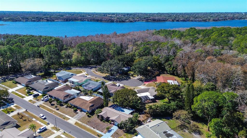 808 Helmsman Way Palm Harbor, FL 34685 - Photo 21 of 27 aerial view of a city and lake view