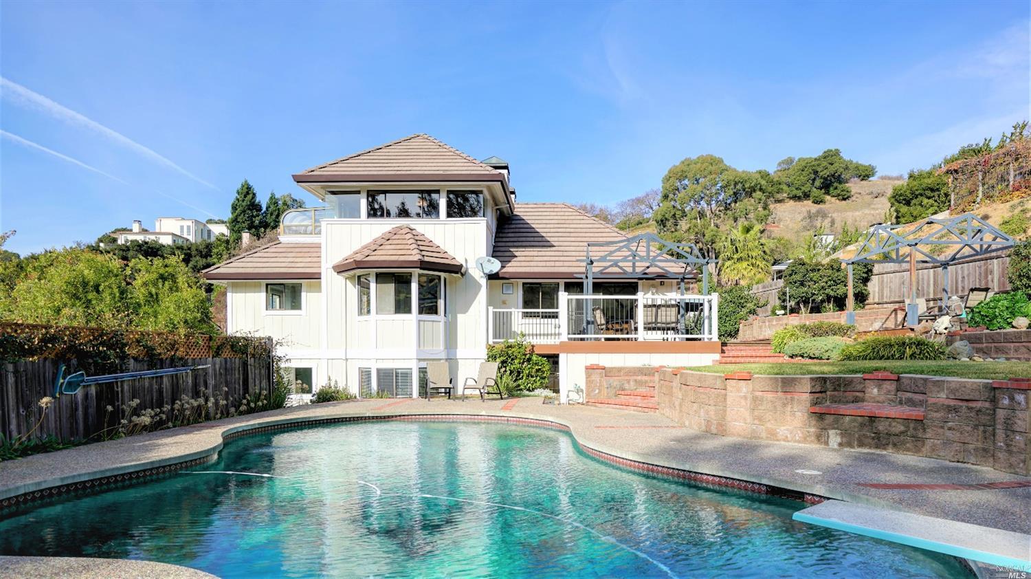 8 Tara Lane Novato, CA 94945 - Photo 1 of 1 an aerial view of a house with swimming pool